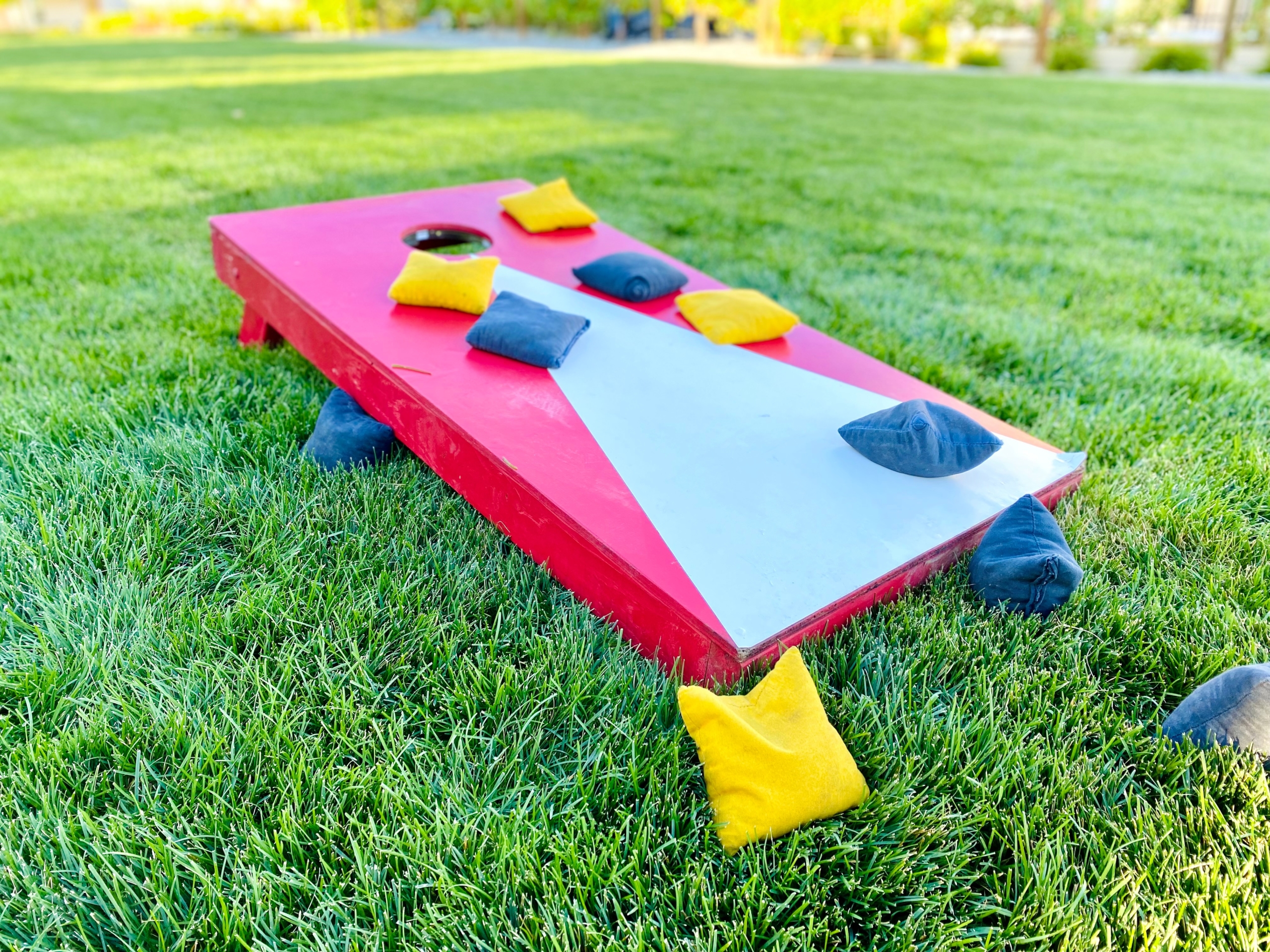 Cornhole board with bean bags - the perfect summer activity!